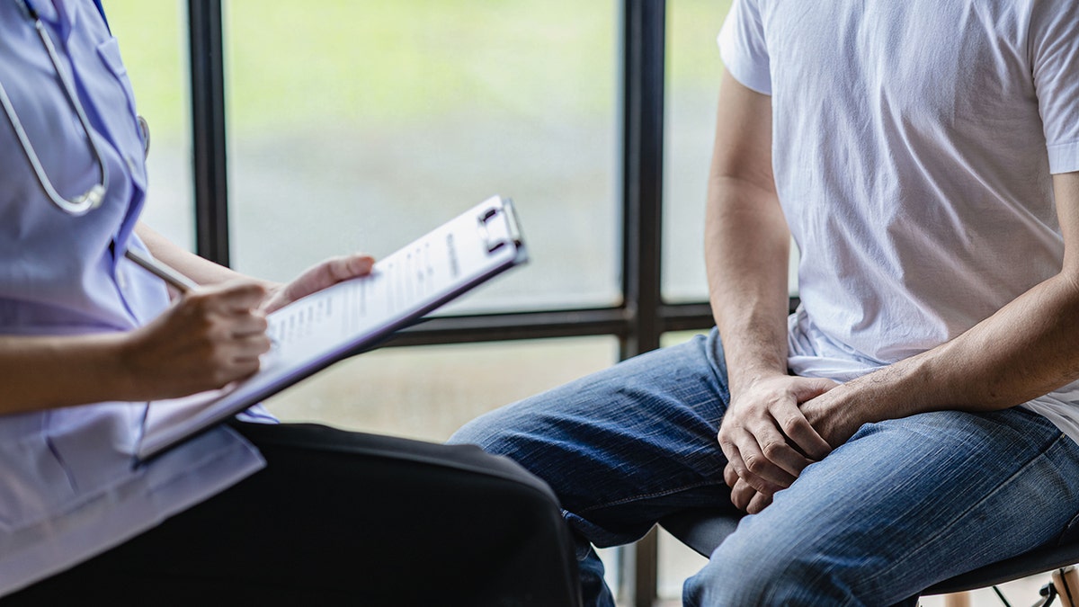 A male patient meets a doctor